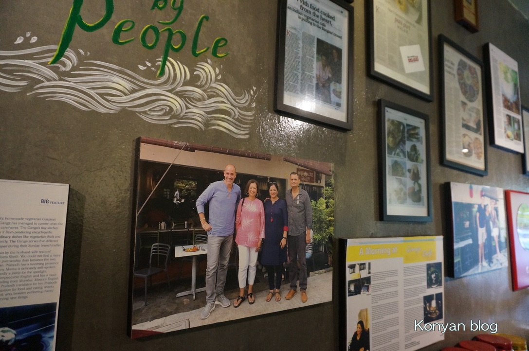 posters on the wall at ganga cafe